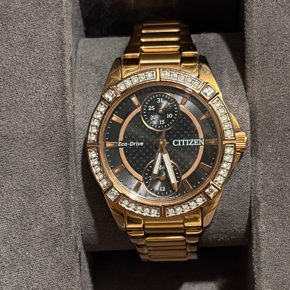 Citizen Eco-Drive woman’s Gold-Tone Crystal Bezel Watch